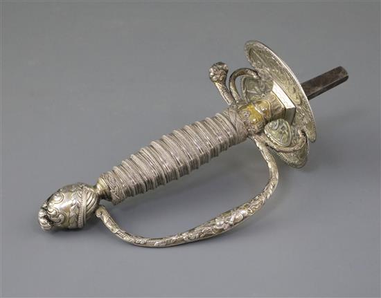 A 19th century Continental silver gilt sword hilt, 7.5in. x 3.5in.